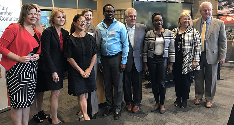 Group shot of the speakers and partners of the mental health breakfast